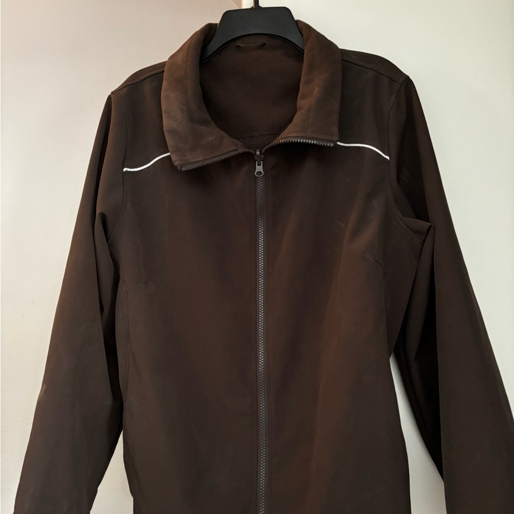 Lightweight brown  jacket great for breezy day.
